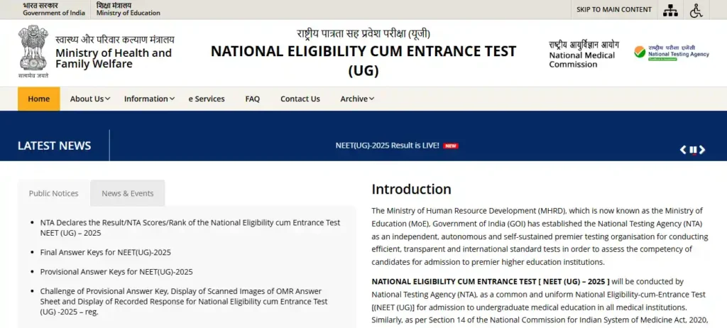 Student holding NEET Admit Card outside exam centre